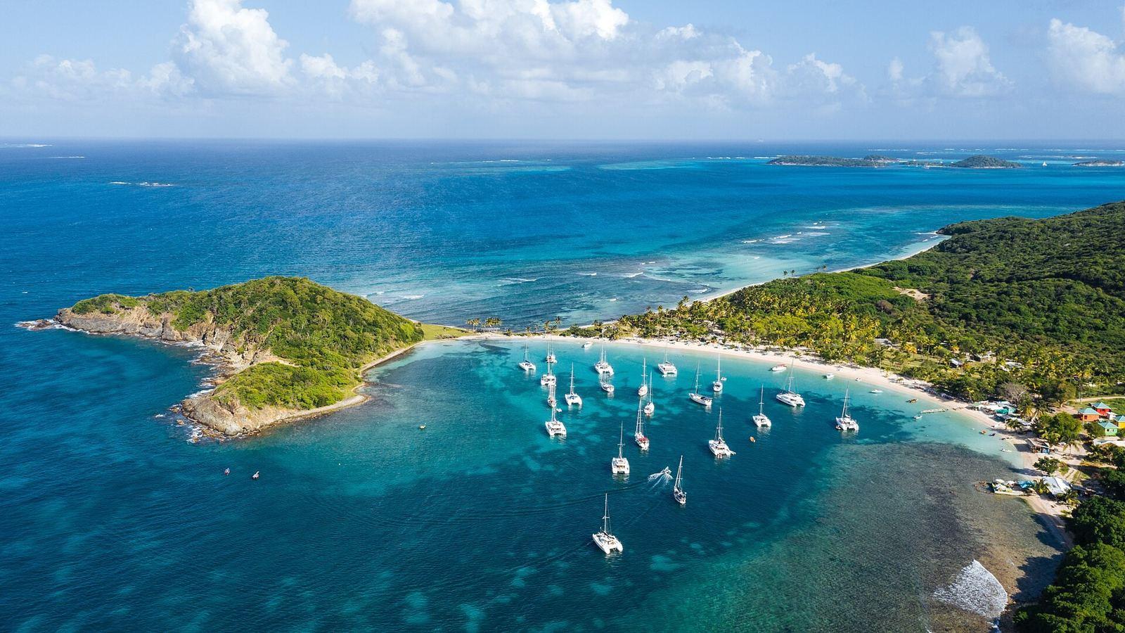 Aerial view of yachts anchored in Salt Whistle Bay on Mayreau, in the Grenadines